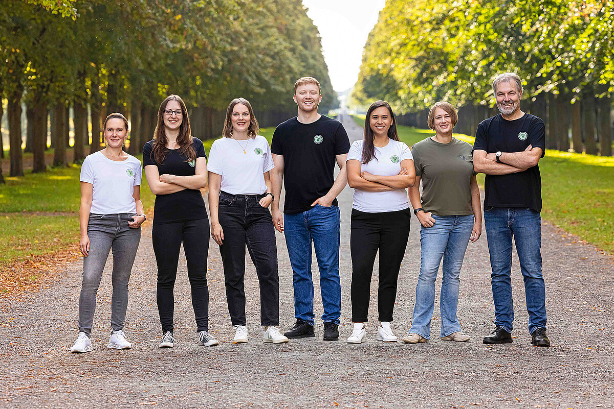 Gruppenfoto mit sieben Personen